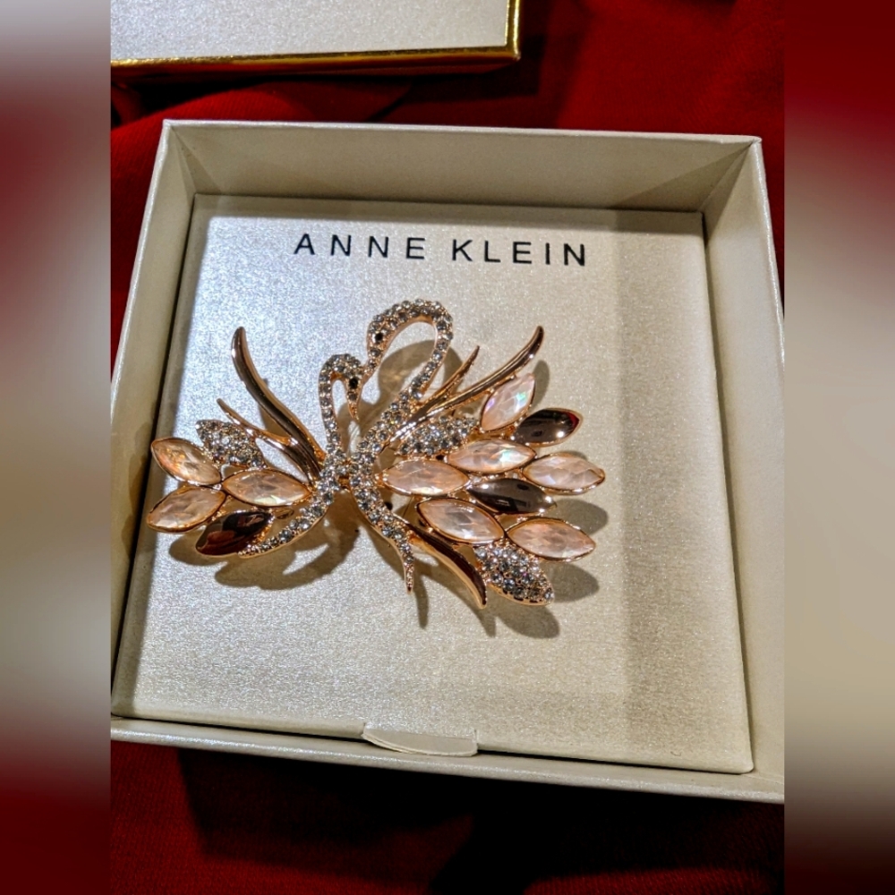 - Anne Klein rose gold tone and crystal swan broach. 2.5 inches long . EUC